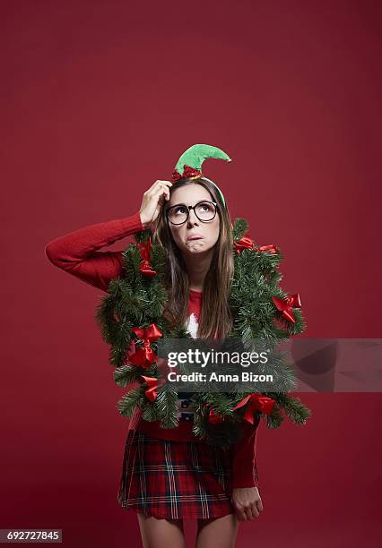 sad woman with christmas problems. debica, poland. - crazy christmas fotografías e imágenes de stock