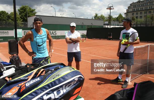 Rafael Nadal of Spain, his uncle/coach Toni Nadal and assistant coach Carlos Moya during practice on day 9 of the 2017 French Open, second Grand Slam...