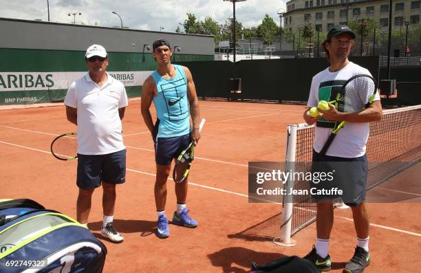 Rafael Nadal of Spain, his uncle/coach Toni Nadal and assistant coach Carlos Moya during practice on day 9 of the 2017 French Open, second Grand Slam...