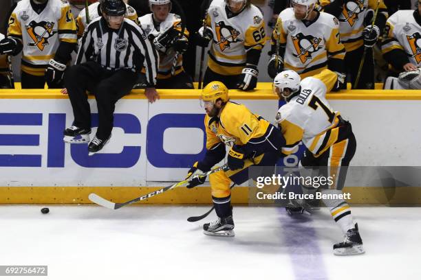 Parenteau of the Nashville Predators is defended by Matt Cullen of the Pittsburgh Penguins during the second period in Game Four of the 2017 NHL...