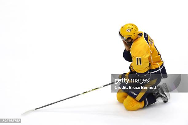 Parenteau of the Nashville Predators grabs his face against the Pittsburgh Penguins during the second period in Game Four of the 2017 NHL Stanley Cup...