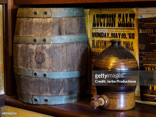 old wine barrel and ceramic cask - metallartikel stock-fotos und bilder