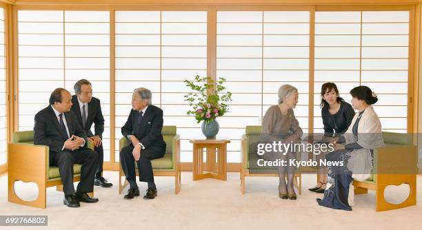 Japanese Emperor Akihito and Empress Michiko meet with Vietnamese Prime Minister Nguyen Xuan Phuc and his wife Tran Nguyet Thu at the Imperial Palace...