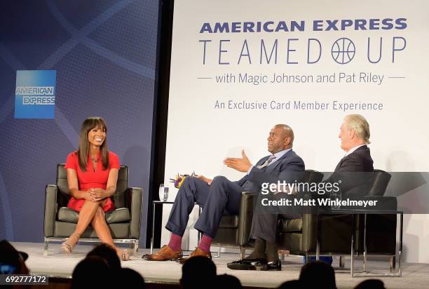 Tv personality Cari Champion, Magic Johnson and Pat Riley speak onstage during the American Express Teamed Up with Magic Johnson and Pat Riley on...