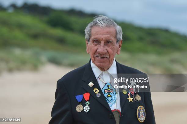 Portrait of Charles Norman Shay , a Native American, a Penobscot tribal elder and a veteran-soldier from WWII, as he looks at the Omaha Beach when he...