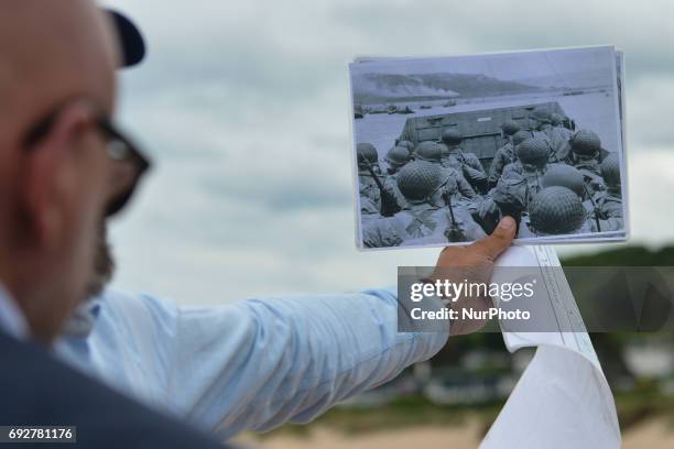 Charles Norman Shay , a Native American, a Penobscot tribal elder and a veteran-soldier from WWII, returns to Omaha beach for the 73rd anniversary of...