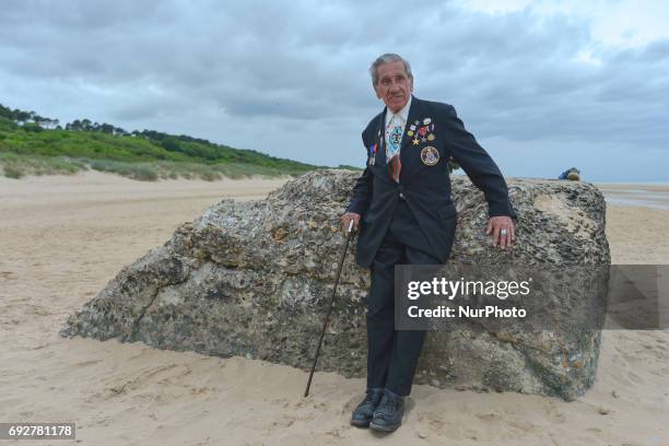 Portrait of Charles Norman Shay , a Native American, a Penobscot tribal elder and a veteran-soldier from WWII, as he looks at the Omaha Beach when he...