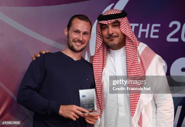 Gregory Gaultier of France receives the PSA Male Player of the Year Award from Ziad Al-Turki, PSA Chairman during Gala Dinner ahead of PSA Dubai...