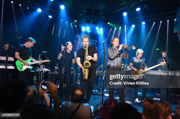 Lou Pardini, Keith Howland, Walfredo Reyes Jr, James Pankow, Ray Herrmann, Tris Imboden, Lee Loughnane, Jeff Coffey and Robert Lamm of Chicago attend...