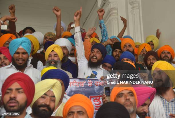 Indian Sikh activists from various radical Sikh organisations shout slogans in support of Sikh leader Sant Jarnail Singh Bhindranwale, and Khalistan...