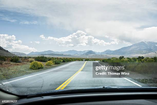 driving in the eastern sierras - car point of view stock pictures, royalty-free photos & images