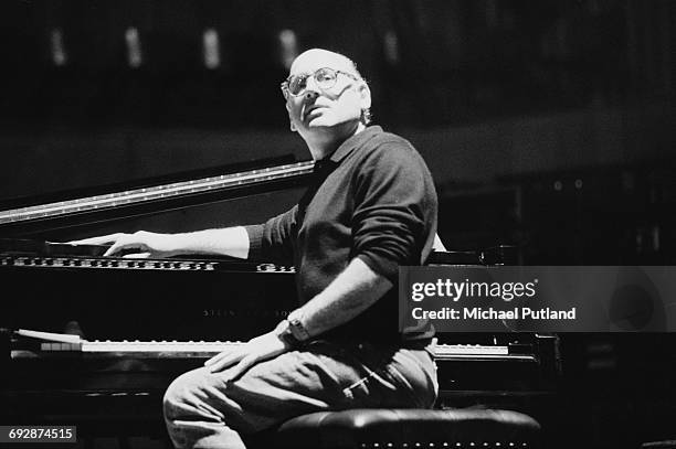 English minimalist composer Michael Nyman at a piano at the Royal Festival Hall London, 1992. He is rehearsing a performance of 'The Michael Nyman...
