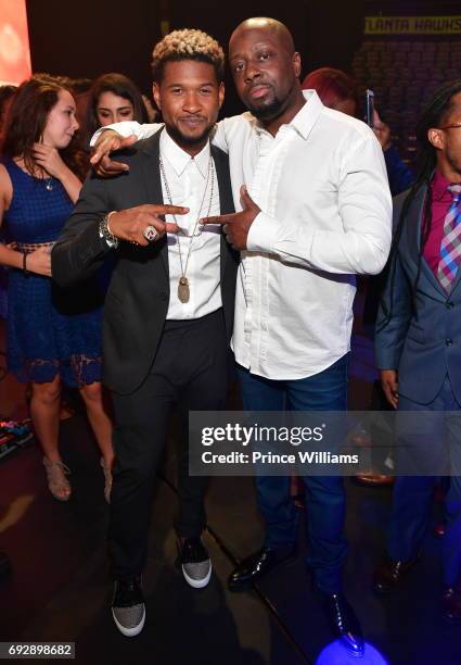 Usher Raymond and Wyclef Jean attend the 2017 Andrew Young International Leadership awards and 85th Birthday tribute at Philips Arena on June 3, 2017...