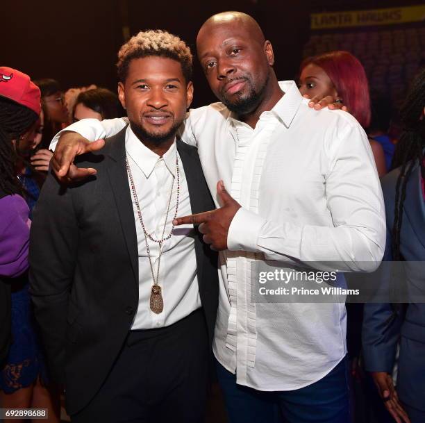 Usher Raymond and Wyclef Jean attend the 2017 Andrew Young International Leadership awards and 85th Birthday tribute at Philips Arena on June 3, 2017...