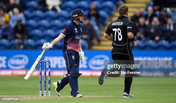 England batsman Eoin Morgan leaves the field after being dismissed by Corey Anderson during the ICC Champions Trophy match between England and New...