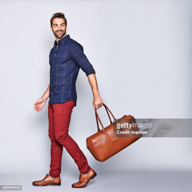 he's off on an adventure - menswear stock pictures, royalty-free photos & images