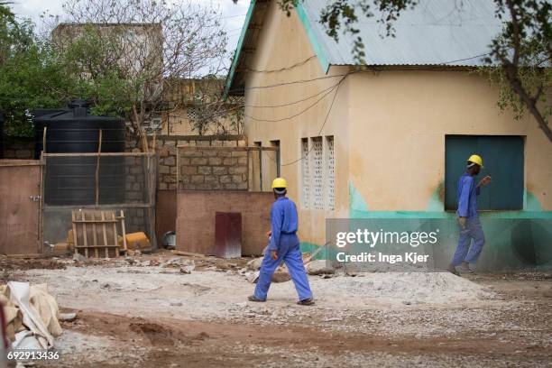 Baidoa, Somalia African men in the rehabilitation center for former fighters of the Al-Shabaab militia. There are two guards at the gate on May 01,...