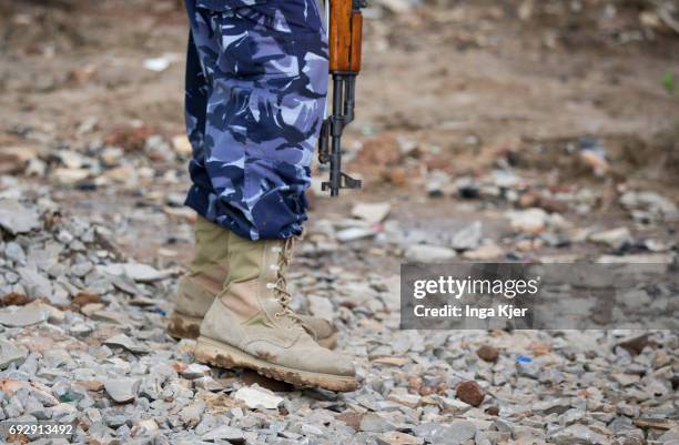 Baidoa, Somalia Close-up of a former militia fighter with a gun in the rehabilitation center for former Al-Shabaab militants on May 01, 2017 in...