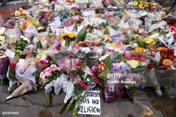Flowers after a minutes silence near the scene of Saturday's terrorist attack, on June 6, 2017 in London, England. The third attacker has been named...