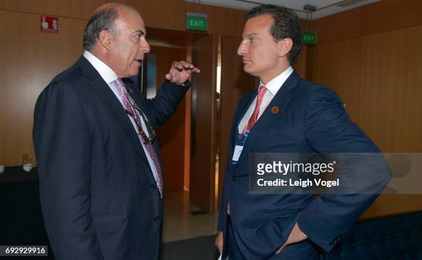 Chairman of the Coca-Cola Company, Leadership Council Member, Concordia Muhtar Kent speaks with CEO of Libra Group George Logothetis during the...