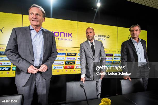 Borussia Dortmund Executive Director Hans-Joachim Watzke , Peter Bosz, the new head coach of Borussia Dortmund, and Michael Zorc , Director of Sports...