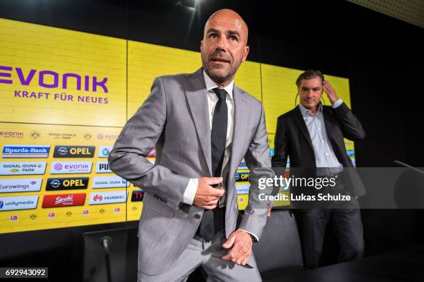 Peter Bosz , the new head coach of Borussia Dortmund, and Michael Zorc , Director of Sports of Borussia Dortmund, attend a press conference at Signal...