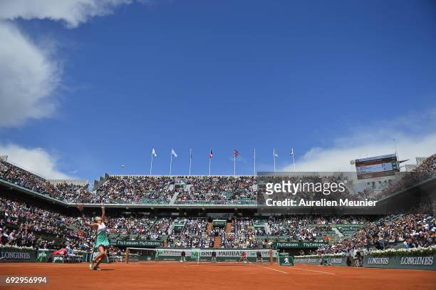 Kristina Mladenovic of France serves during the women's singles quarterfinal match against Timea Bacsinsky of Switzerland on day ten of the 2017...