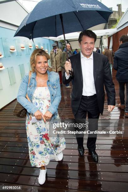 Politician Christian Estrosi and his wife journalist Laura Tenoudji attend the 2017 French Tennis Open - Day Ten at Roland Garros on June 6, 2017 in...