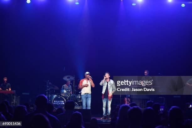 Recording Artists Darius Rucker and Michael Ray perform onstage during 8th Annual Darius and Friends concert at Ryman Auditorium on June 5, 2017 in...