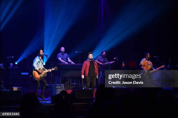 Recording Artists Dan Smeyers and Shay Mooney of Dan + Shay perform onstage during 8th Annual Darius and Friends concert at Ryman Auditorium on June...