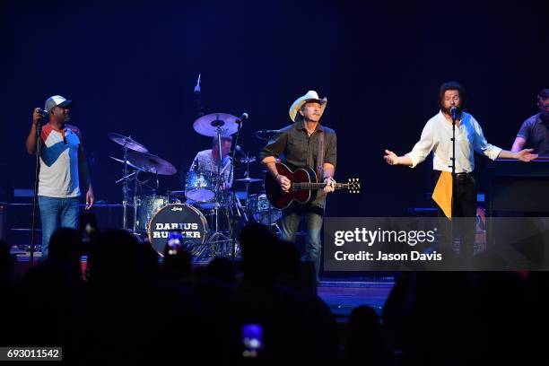 Recording Artists Darius Rucker and Kix Brooks and Ronnie Dunn of Brooks and Dunn perform onstage during 8th Annual Darius and Friends concert at...