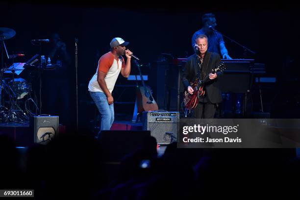 Recording Artists Darius Rucker and Paul Sanchez performs onstage during 8th Annual Darius and Friends concert at Ryman Auditorium on June 5, 2017 in...