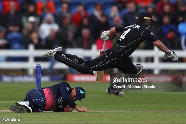 Neil Broom of New Zealand is upended by Jason Roy of England going for a quick single during the ICC Champions Trophy match between England and New...