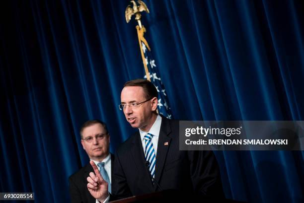 Acting DEA Administrator Chuck Rosenberg listens while Deputy Attorney General Rod Rosenstein speaks about fentanyl at the headquarters of the Drug...