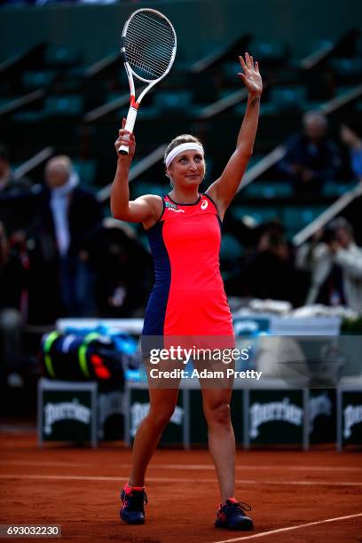 Timea Bacsinszky of Switzerland celebrates victory during ladies singles Quarter Finals match against Kristina Mladenovic of France on day ten of the...