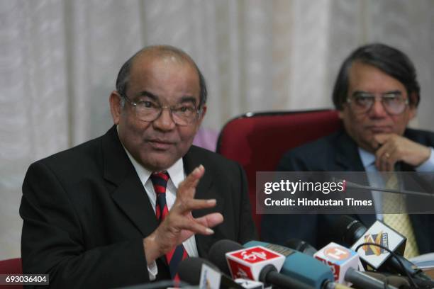 Governor YV Reddy governor Y.V.Reddy speaks as Deputy governor Rakesh Mohan looks on during a news conference in Mumbai announcing the new credit...