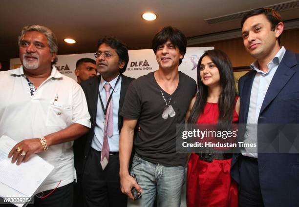 Player Auction Vijay Mallya, Modi, Shah Rukh Khan, Priety Zinta and Ness Wadia pose for media after the IPL Players' auction at Hilton Towers on...