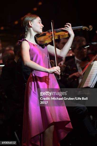 Alma Deutscher performs on stage during the Life + Celebration Concert at Burgtheater on June 6, 2017 in Vienna, Austria. The concert marks the...