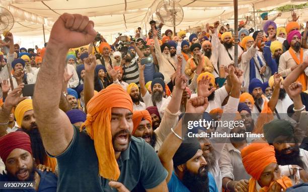 Sikh radical activists raising the pro-Khalistan slogans on the 33rd anniversary of Operation Blue Star at Akal Takht Sahib, Golden Temple, on June...