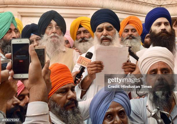 Baba Baljit Singh Daduwal, Bhai Dhian Singh Mand along with Simranjit Singh Mann addressing the gathering during a protest against Jathedar Gaini...