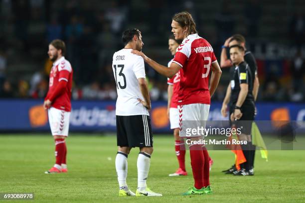 Lars Stindl of Germany and Jannik Vestergaard of Denmark talk after the friendly match between Denmark v Germany on June 6, 2017 in Brondby, Denmark.