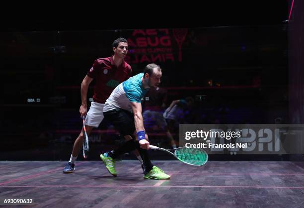 Gregory Gaultier of France competes against Ali Farag of Egypt during day one of the PSA Dubai World Series Finals 2017 at Dubai Opera on June 6,...