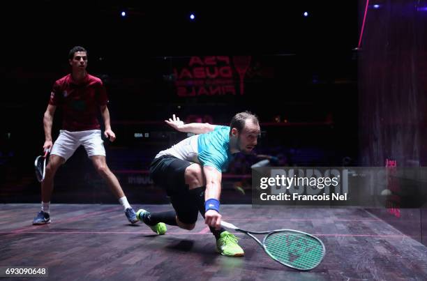 Gregory Gaultier of France competes against Ali Farag of Egypt during day one of the PSA Dubai World Series Finals 2017 at Dubai Opera on June 6,...