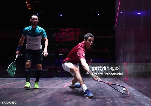 Gregory Gaultier of France competes against Ali Farag of Egypt during day one of the PSA Dubai World Series Finals 2017 at Dubai Opera on June 6,...