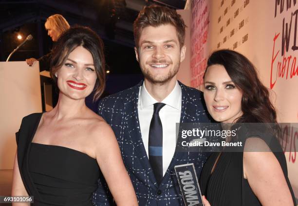 Samantha Chapman and Nicola Chapman of Pixiwoo, winners of the Youtubers award, pose with their brother Jim Chapman at the Glamour Women of The Year...