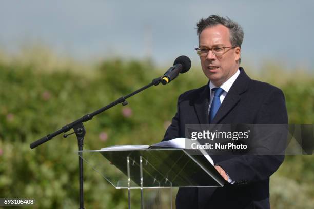 The ambassador of the United Kingdom to France, Edward Llewellyn (Lord Llewellyn of Steep, speaks to the crowd during the International Commemorative...