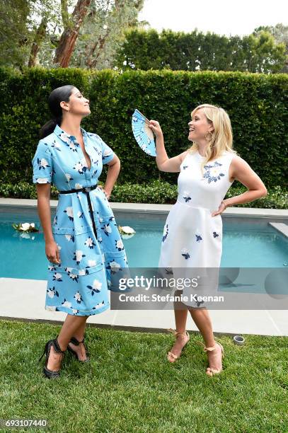 Camila Alves and Reese Witherspoon attend NET-A-PORTER x Draper James Event on June 6, 2017 in Beverly Hills, California.
