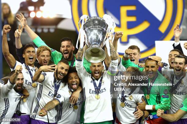 Sergio Ramos of Real Madrid lifts The Champions League trophy after the UEFA Champions League Final between Juventus and Real Madrid at National...