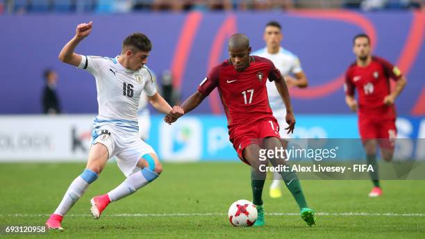 Xande Silva of Portugal is tackled by Federico Valverde of Uruguay during the FIFA U-20 World Cup Korea Republic 2017 Quarter Final match between...