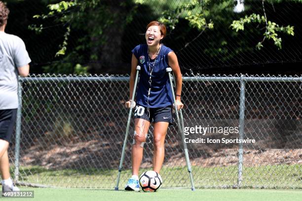 Yuri Kawamura on crutches while awaiting results from an MRI on her right knee after suffering an injury in the previous game of the North Carolina...